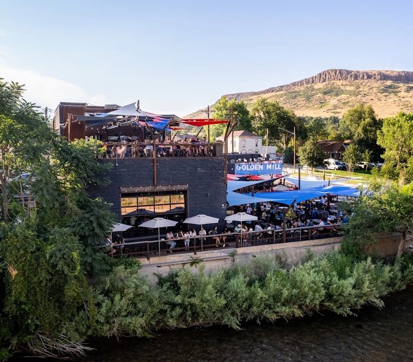 The Golden Mill food hall in Golden, Colorado, with creekside and rooftop patios