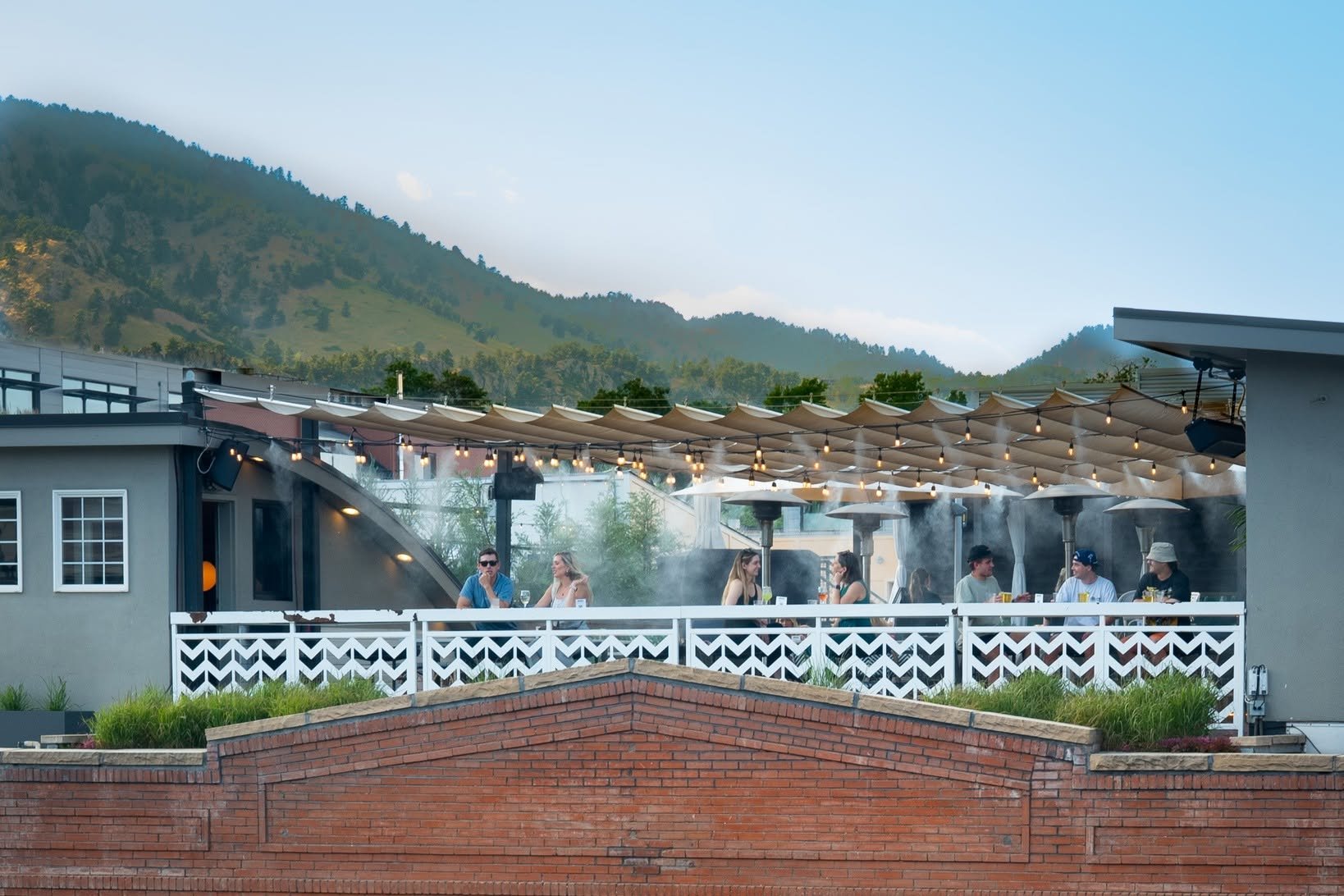 The rooftop patio at Rosetta Hall in Boulder, with the foothills beyond