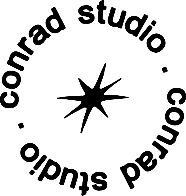 Black stylized lion head logo facing right with one front paw raised.