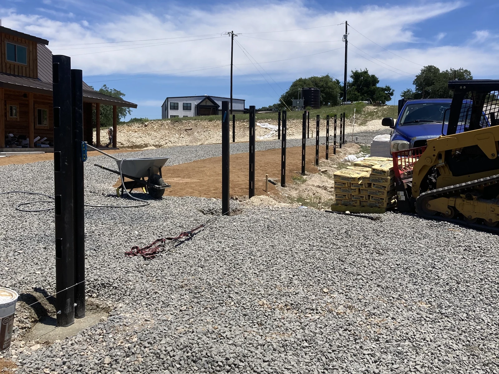Fence post layout and equipment during the Texas Hill Country cabin fence installation