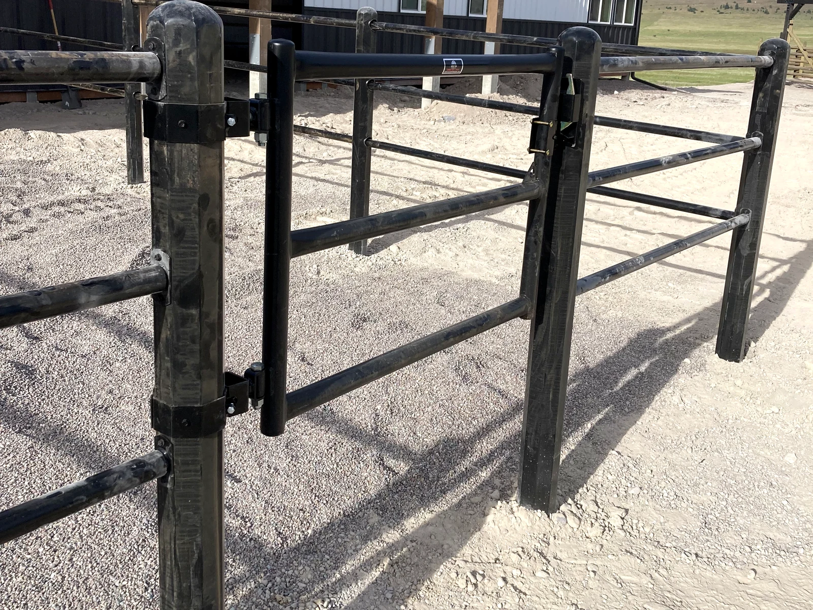 Black Priefert Estate Fence corner detail at the Big Arm barn paddocks