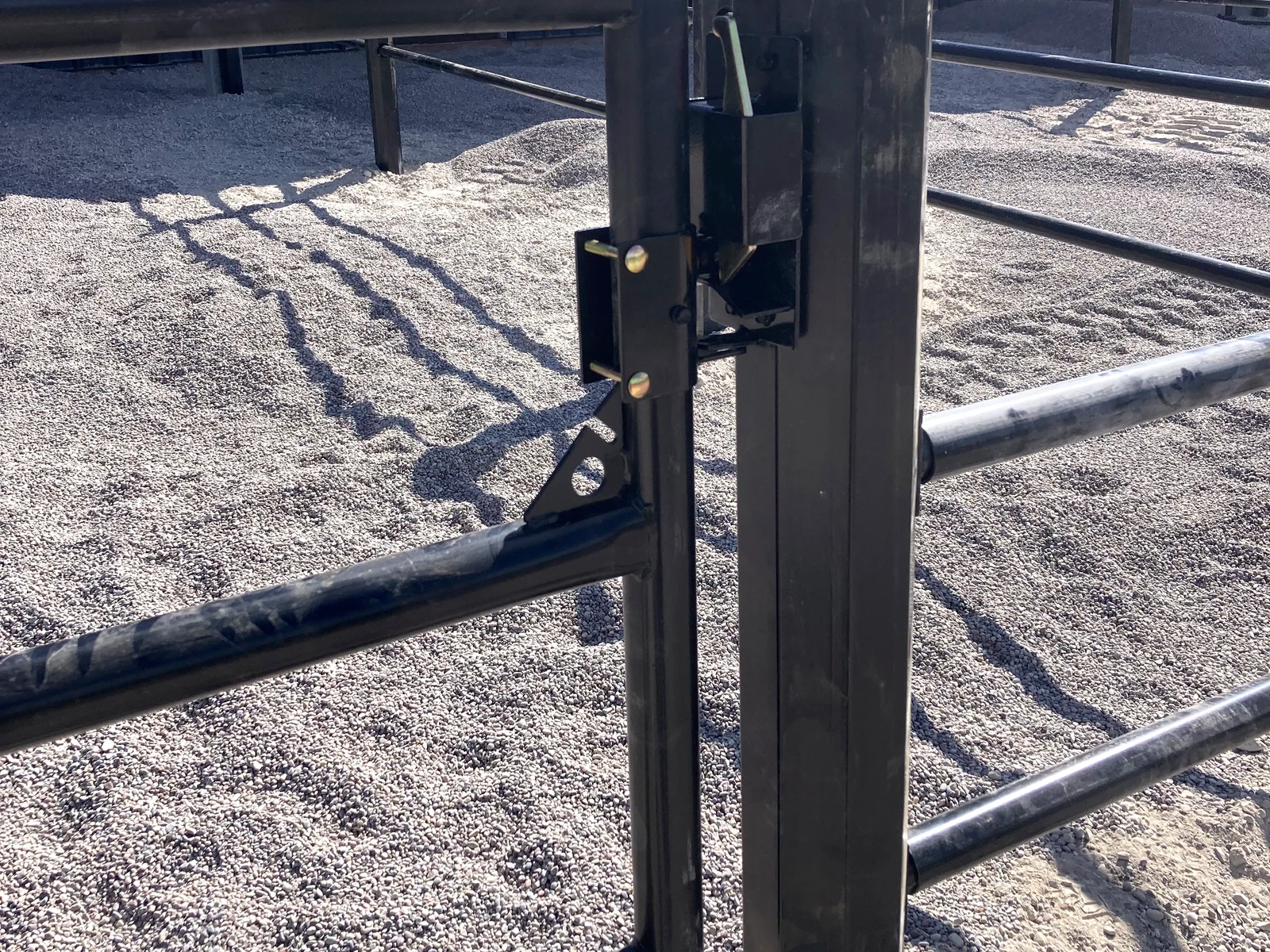 Close detail of a black Priefert Estate Fence post at the Montana paddocks