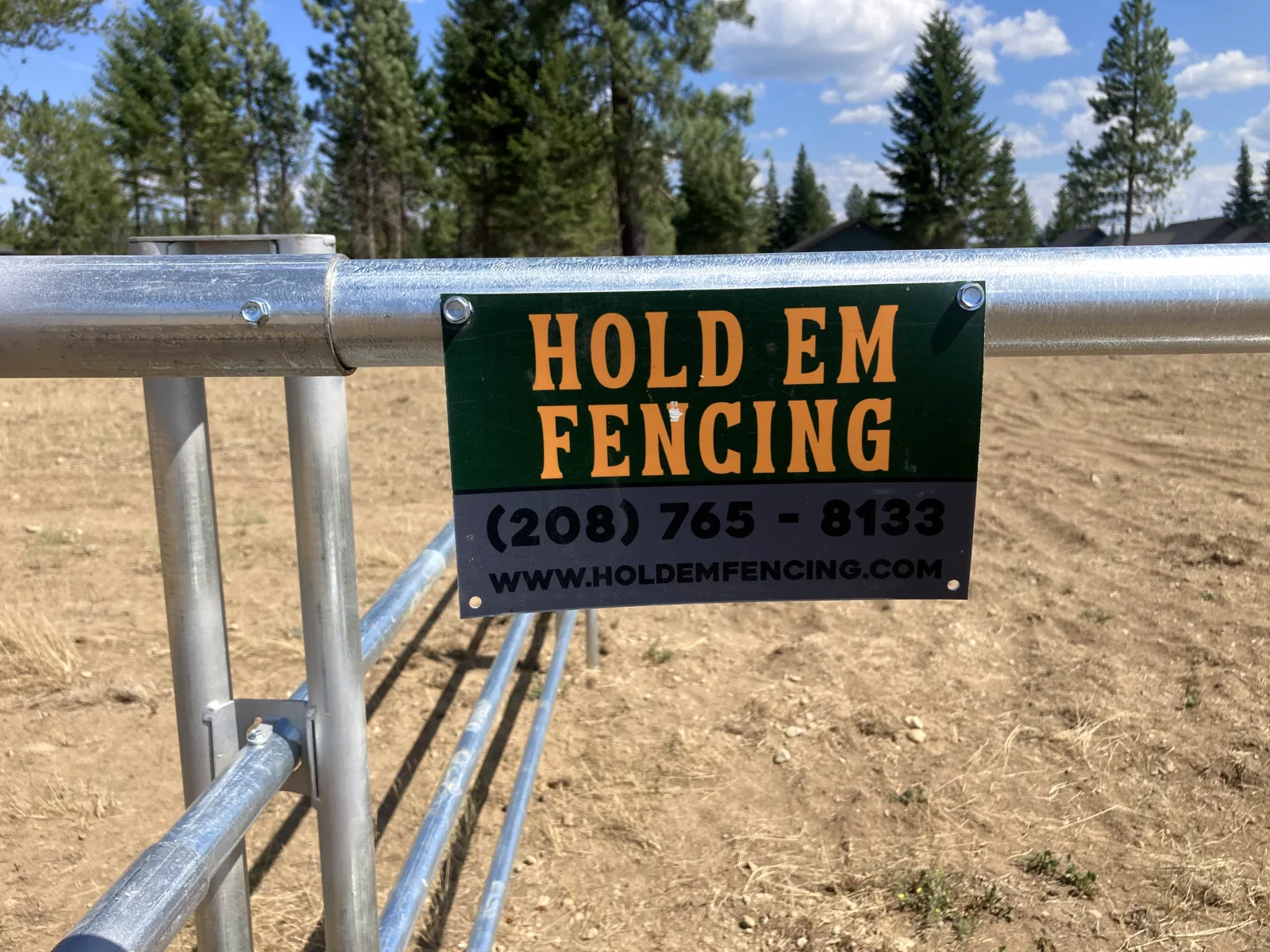 Project sign on fence at the Hayden, Idaho Dream Ranch project