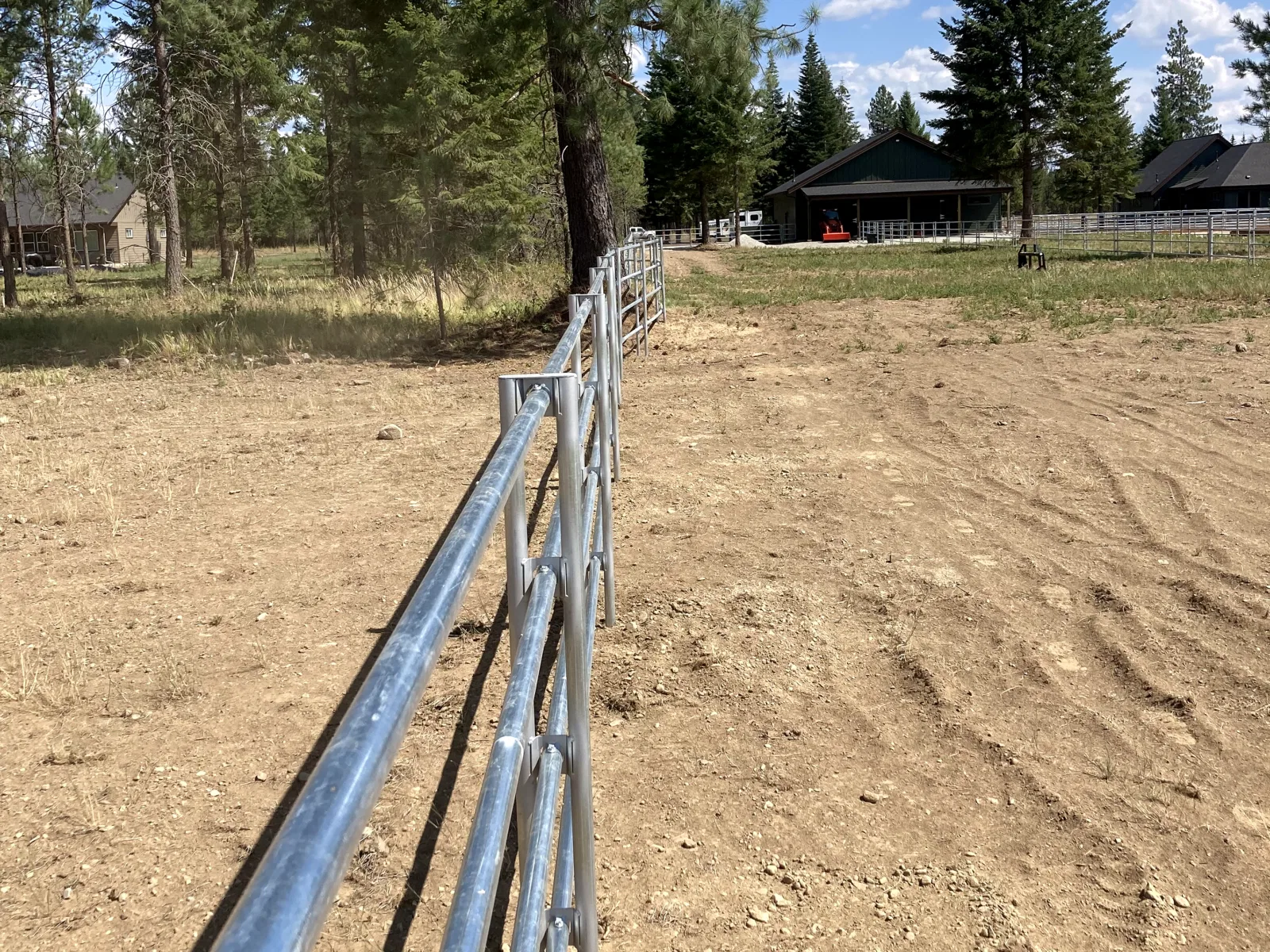 Long run toward house at the Hayden, Idaho Dream Ranch project