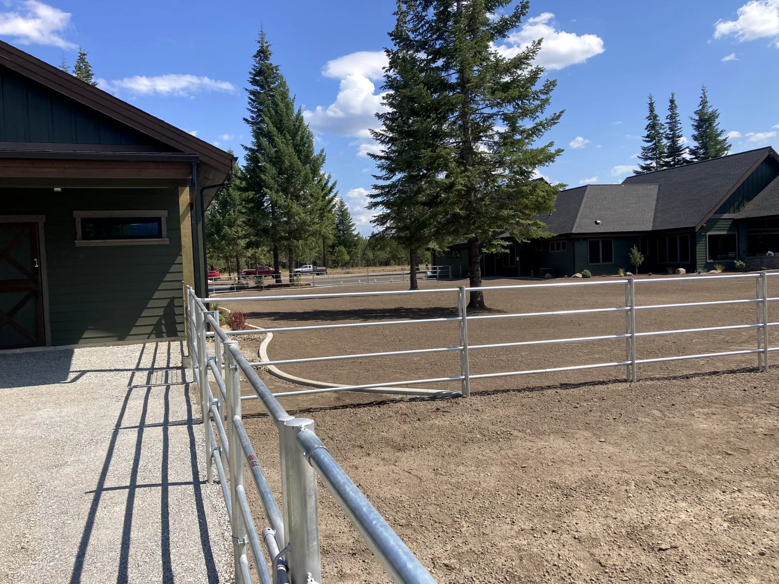 Arena rail perspective at the Hayden, Idaho Dream Ranch project