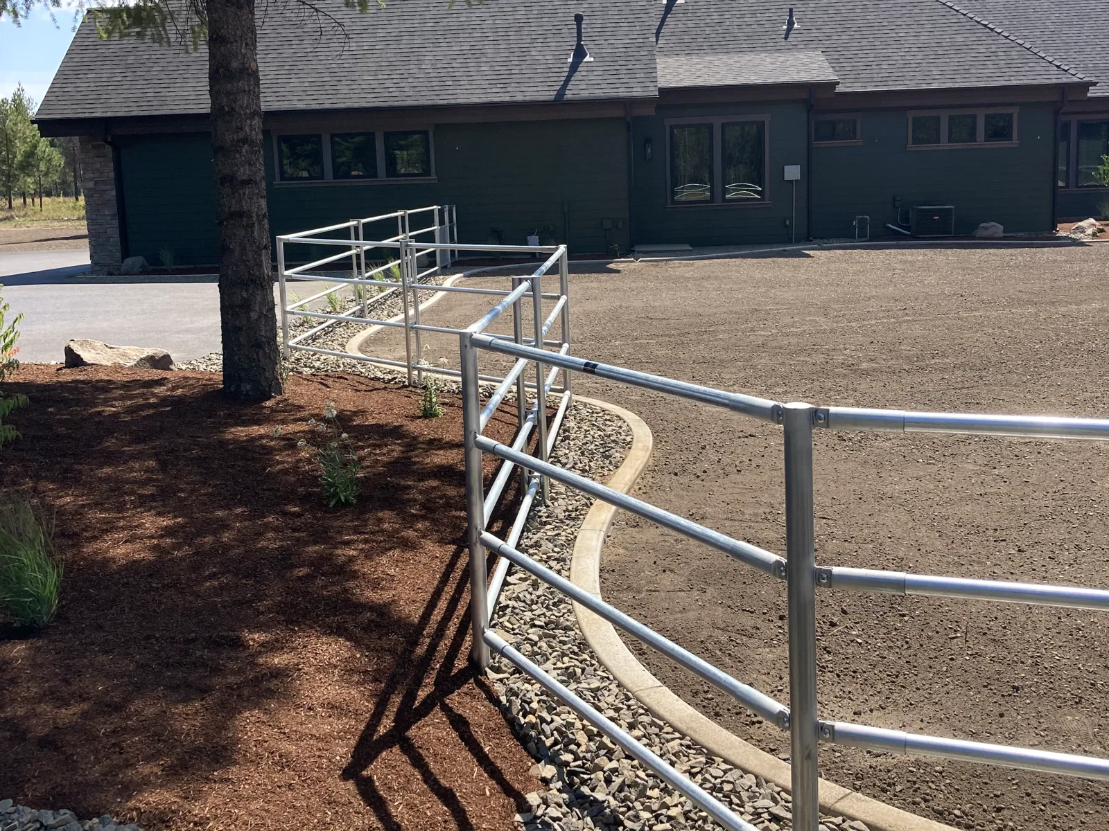 Curved yard fence angle at the Hayden, Idaho Dream Ranch project