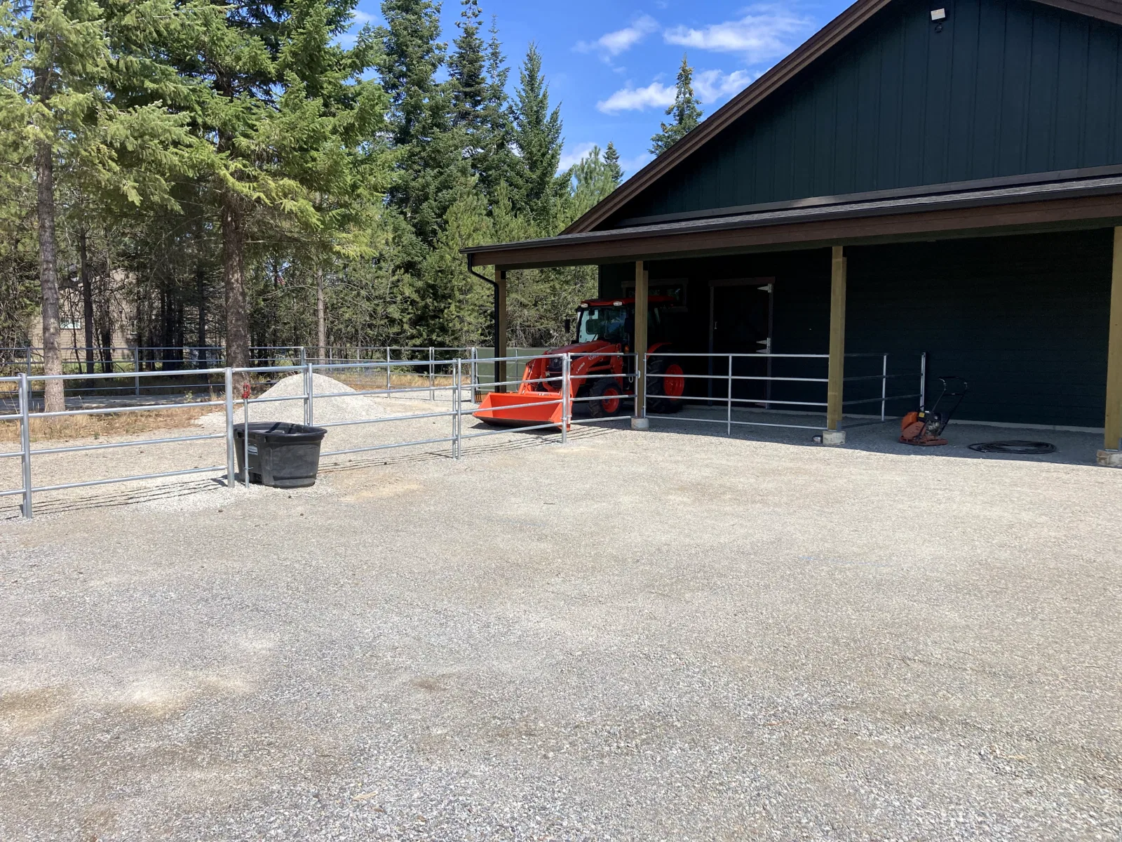 Shop and arena gate at the Hayden, Idaho Dream Ranch project