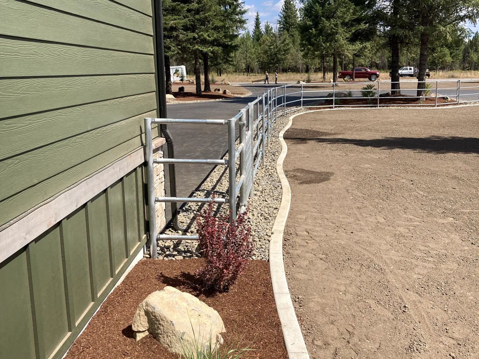 Landscaped house-side fence at the Hayden, Idaho Dream Ranch project