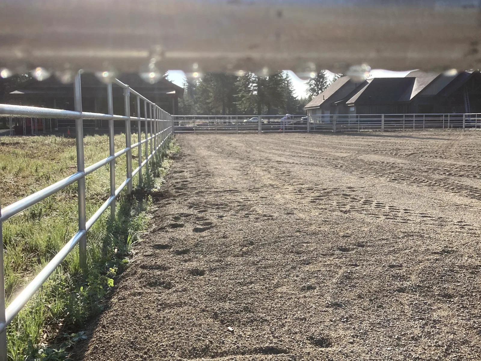 Backlit fence run at the Hayden, Idaho Dream Ranch project