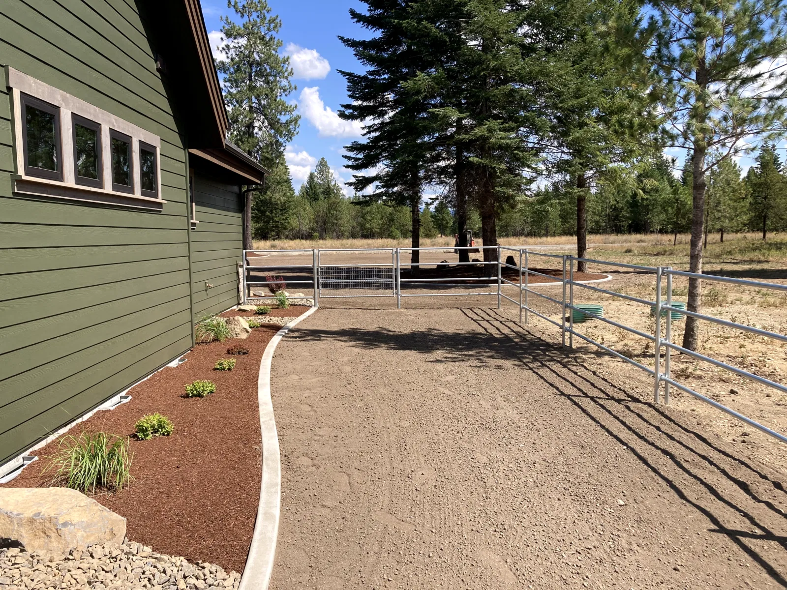 Landscaped house-side run at the Hayden, Idaho Dream Ranch project