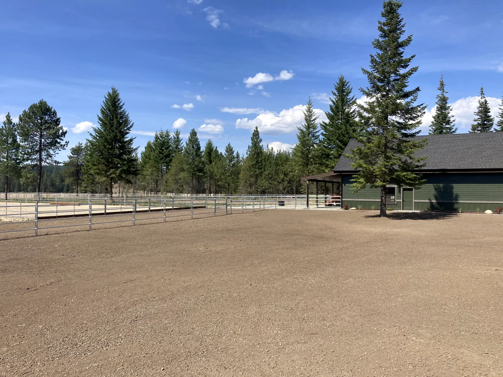 Arena and house overview at the Hayden, Idaho Dream Ranch project