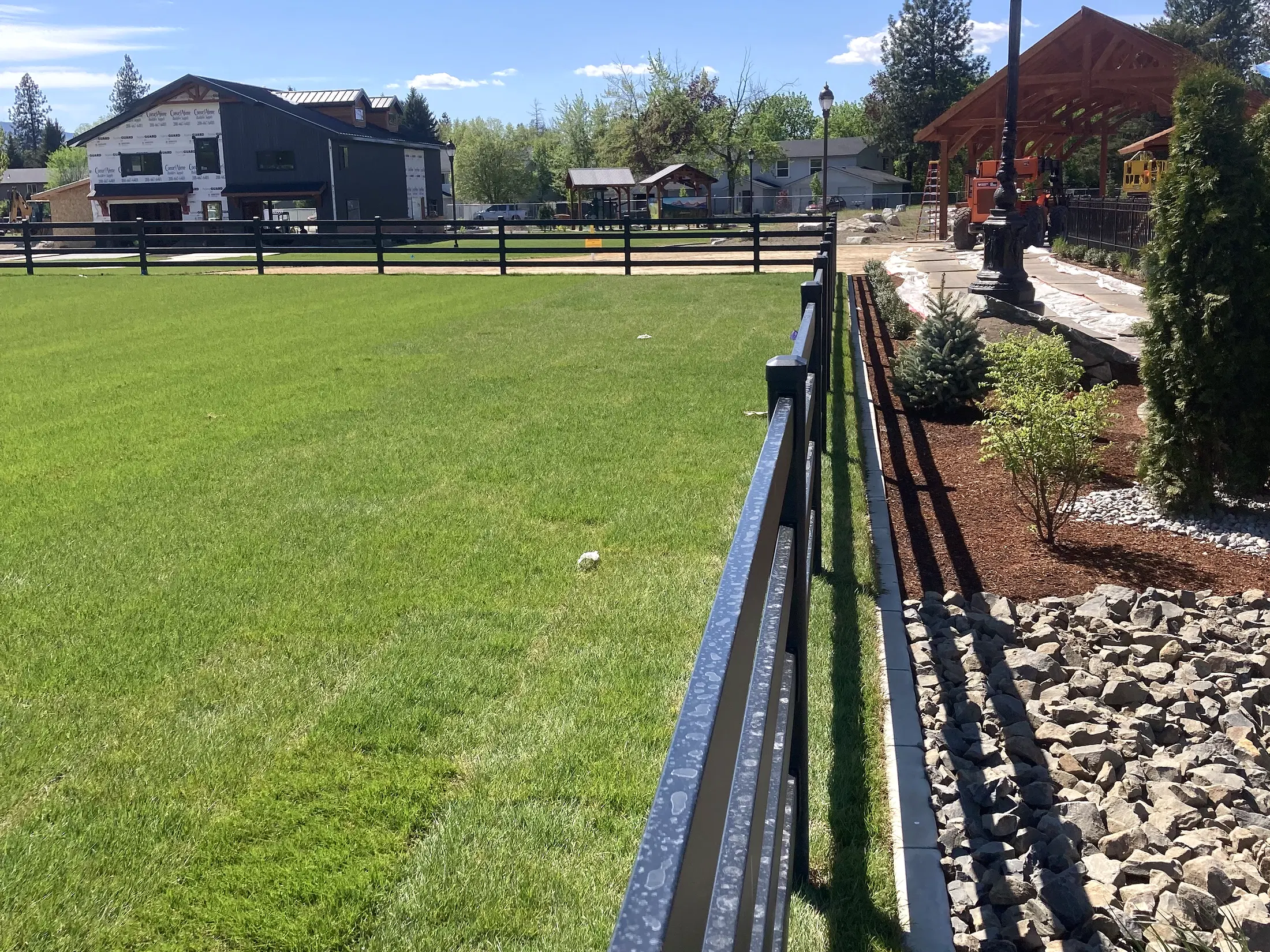 Landscaped edge perspective at Faith Walk Community Fitness Park in Coeur d'Alene, Idaho