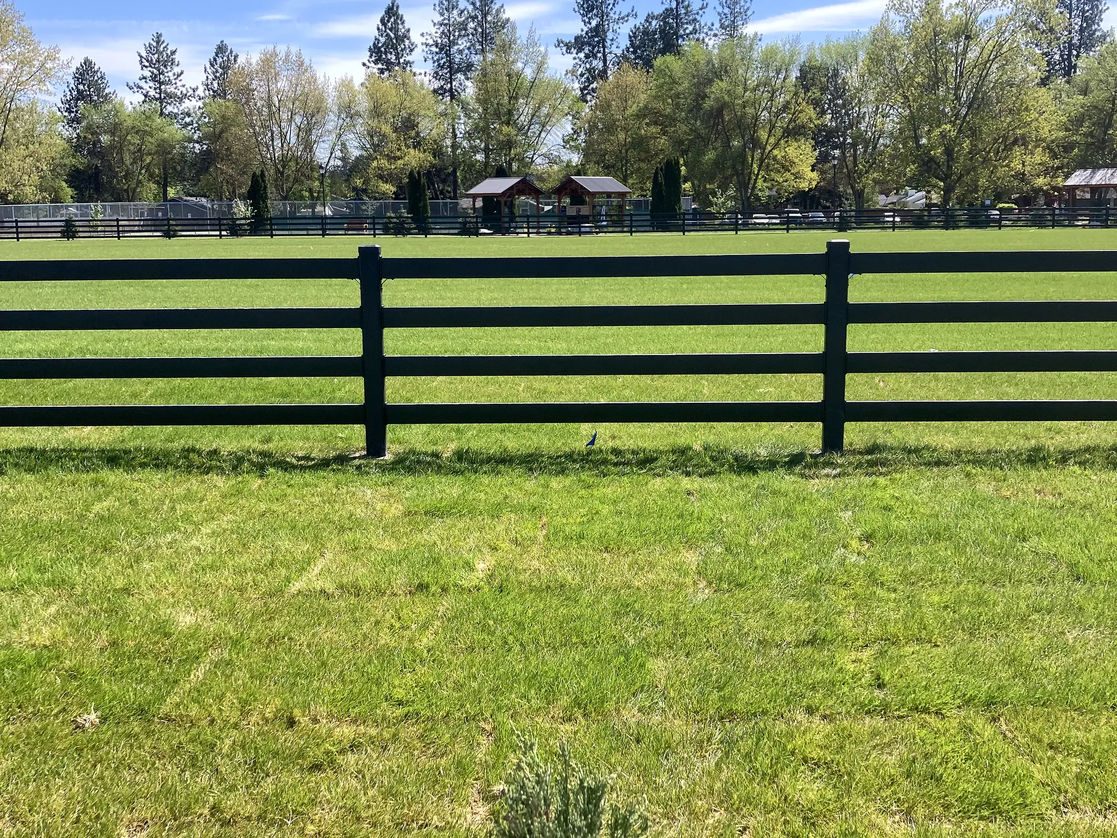 Landscaped long fence run at Faith Walk Community Fitness Park in Coeur d'Alene, Idaho