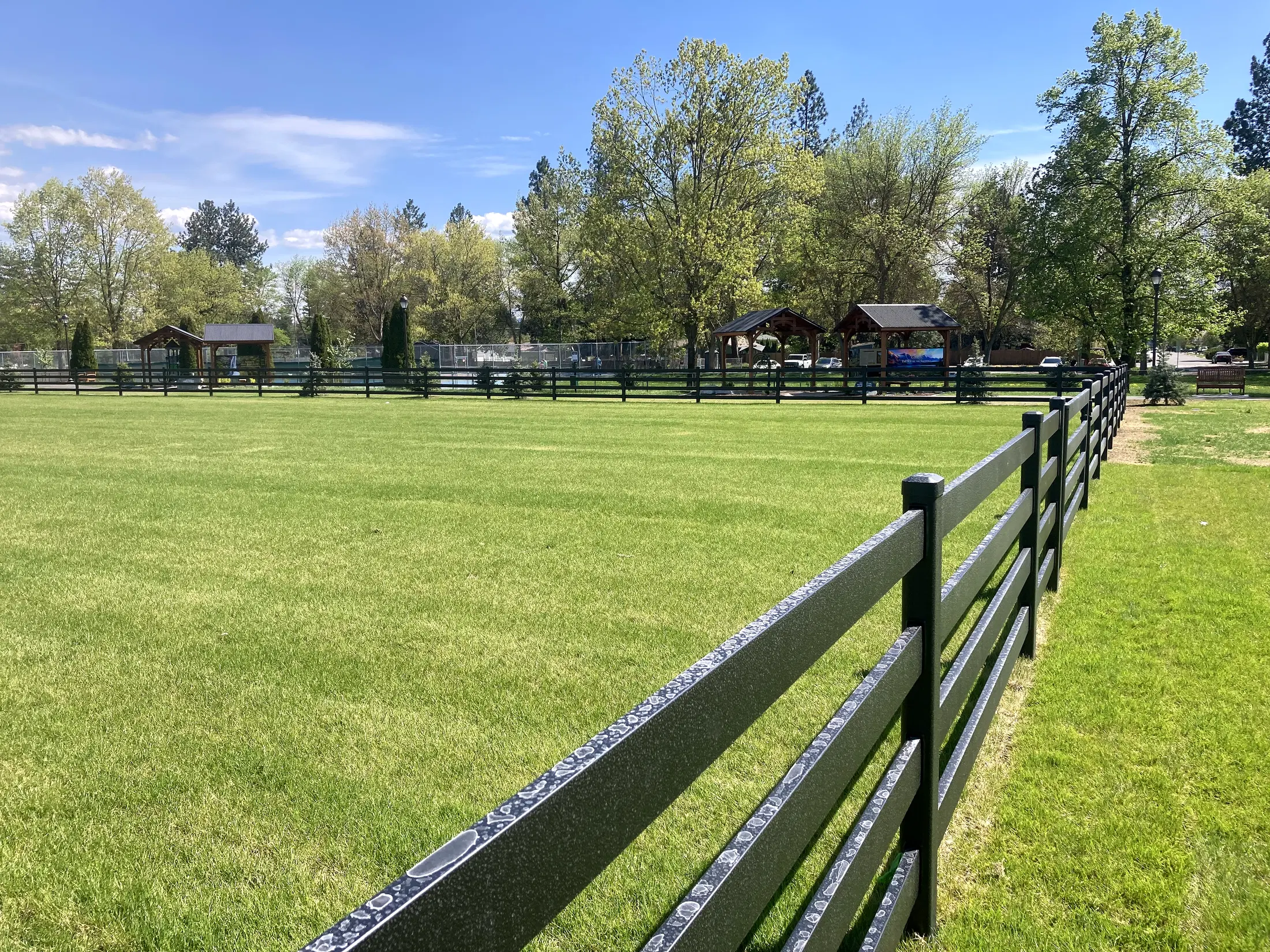 Main card candidate; fence, field, and park context at Faith Walk Community Fitness Park in Coeur d'Alene, Idaho