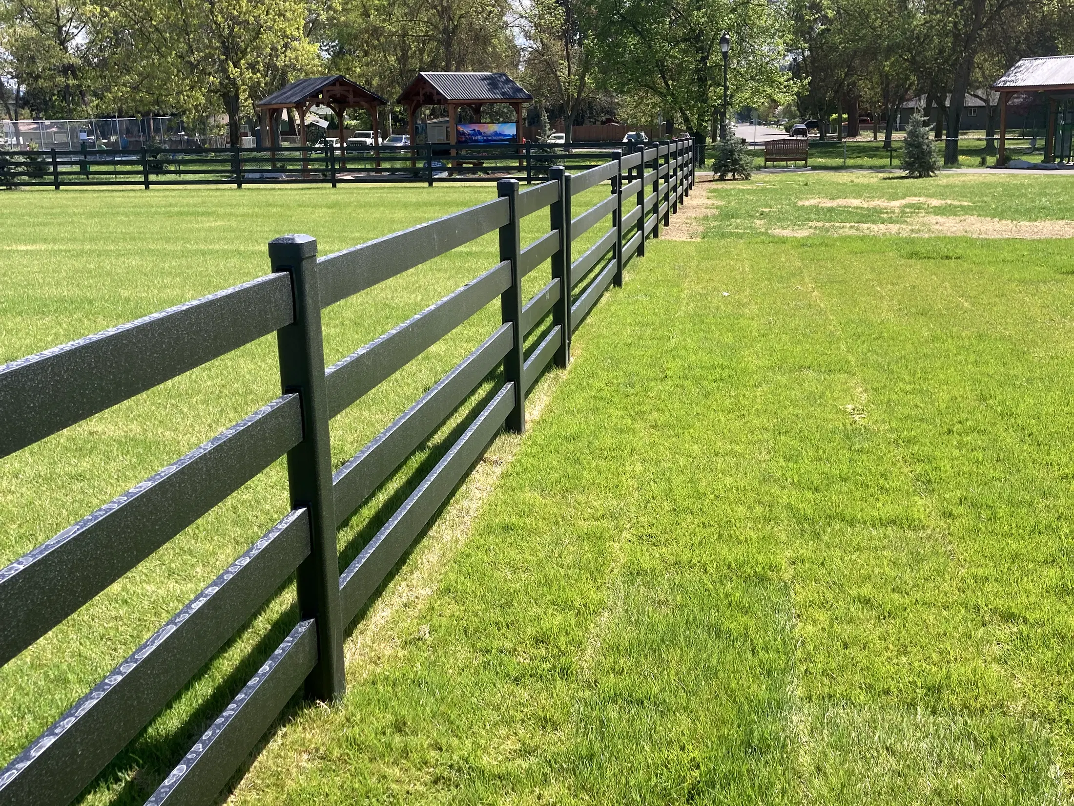 Long field-side fence run at Faith Walk Community Fitness Park in Coeur d'Alene, Idaho