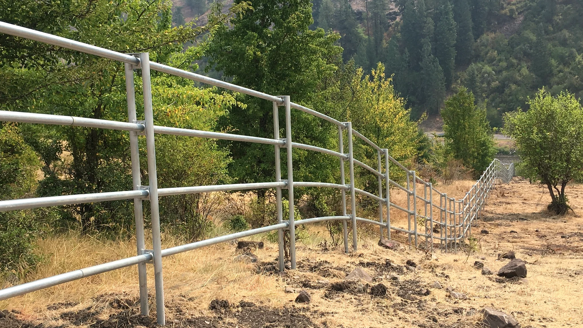 Scenic Noble Contour fence descending rugged ranch terrain near Stites, Idaho
