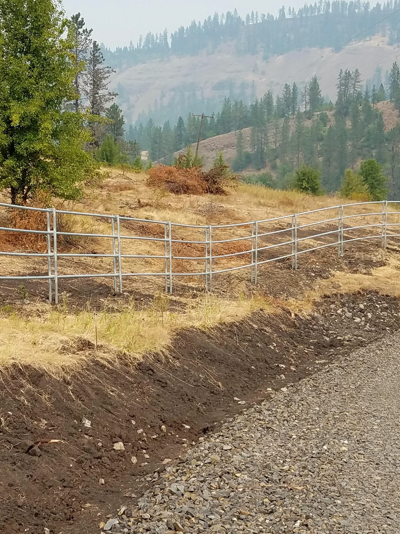 Roadside Noble Contour fence following rolling ground near Stites, Idaho