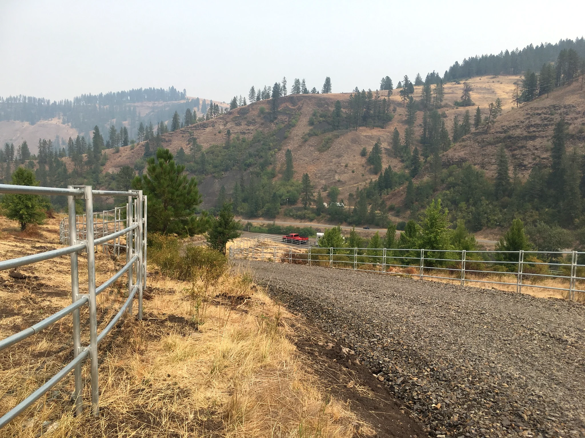 Noble Contour fence and driveway overlook on the rugged ranch near Stites, Idaho