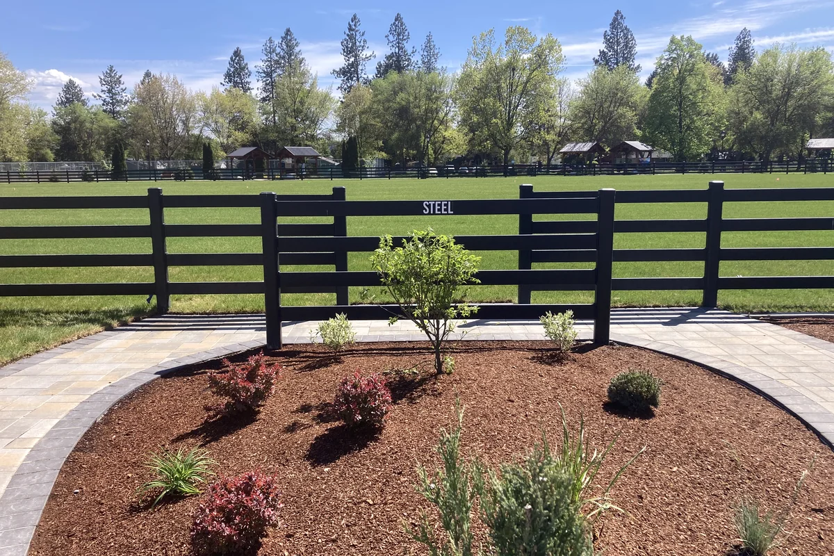 Modern three rail ranch fence idea