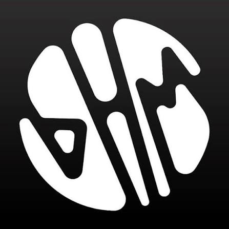 Abstract white shapes forming a symmetric geometric design inside a black circular background.