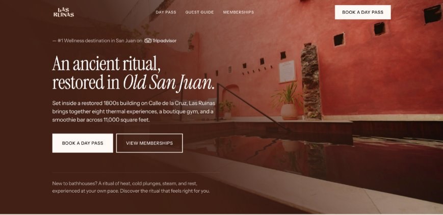 The top of the landing page: a restored courtyard pool, the headline An ancient ritual restored in Old San Juan, and two buttons: book a day pass and view memberships