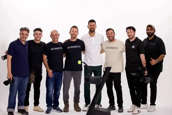 A group of men standing next to each other.