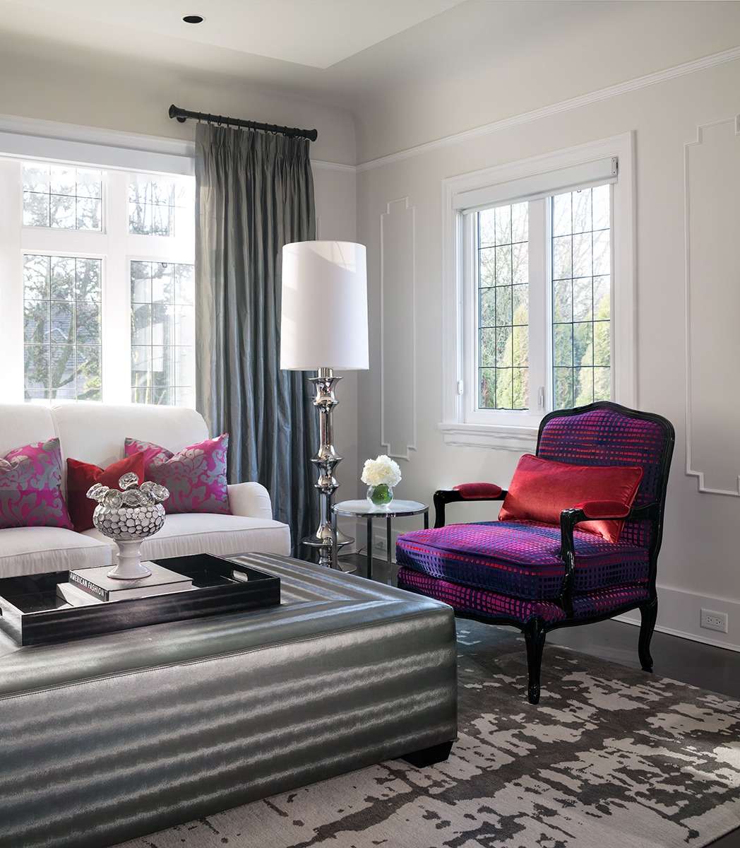 Bright renovated kitchen and living area that blends historic details with modern finishes