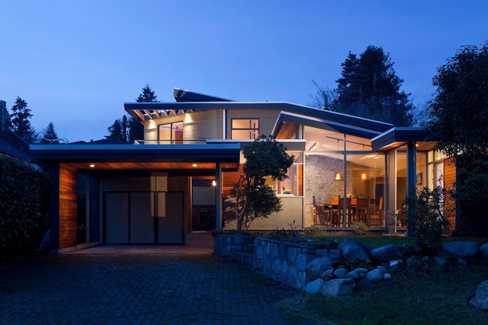 Small character home with a subtle modern addition on a tree-lined residential street