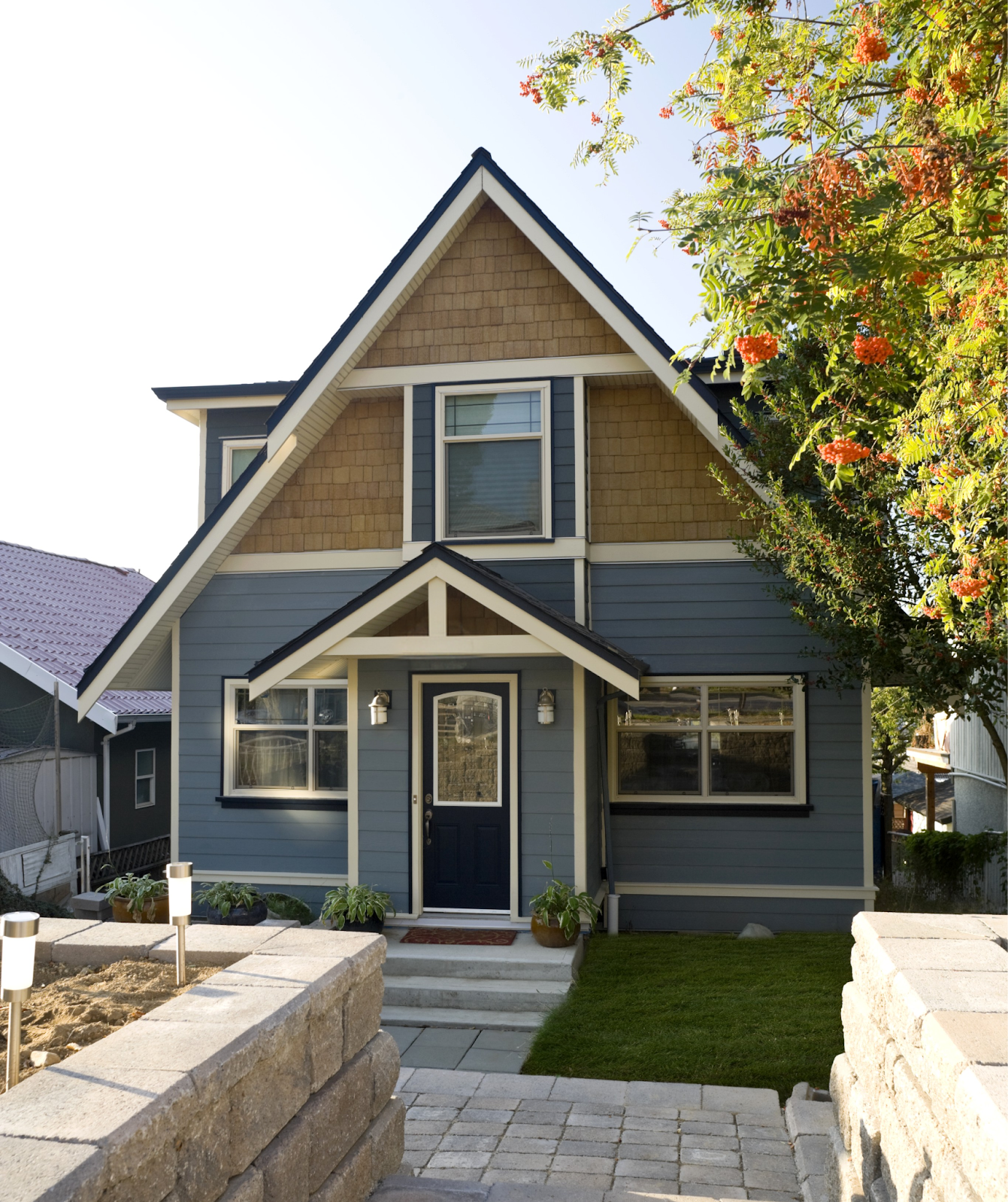 Small home with a well-integrated second-storey addition in a residential neighbourhood