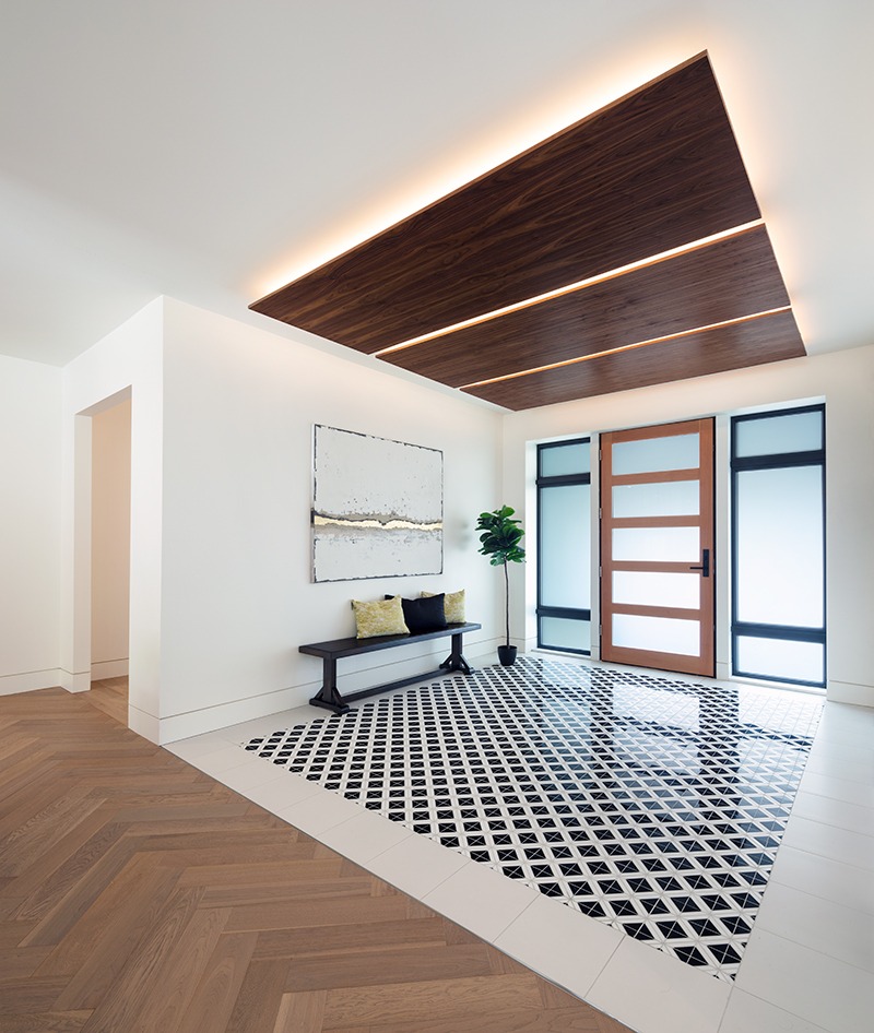 Finished custom home interior with open-concept kitchen and living area