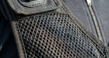 Close up of military grade nylon mesh used in tactical vest production.