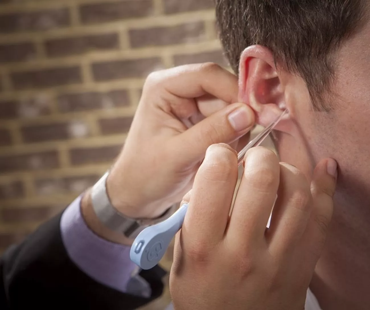 Ear wax removal.