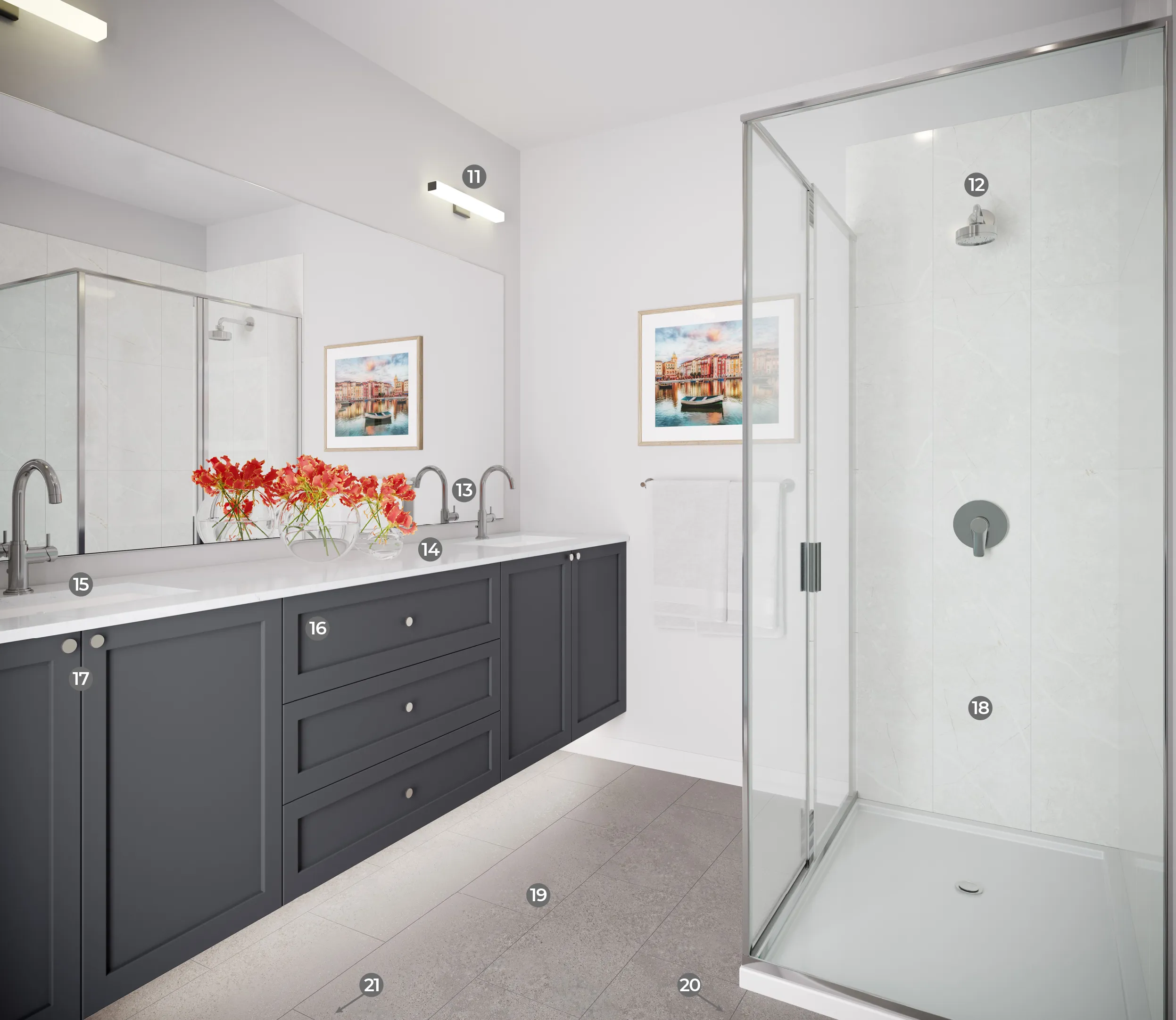 Modern bathroom interior with dark gray double vanity featuring white countertop, two faucets, red flowers in glass vases, large mirror at Dawson + Sawyer condos
