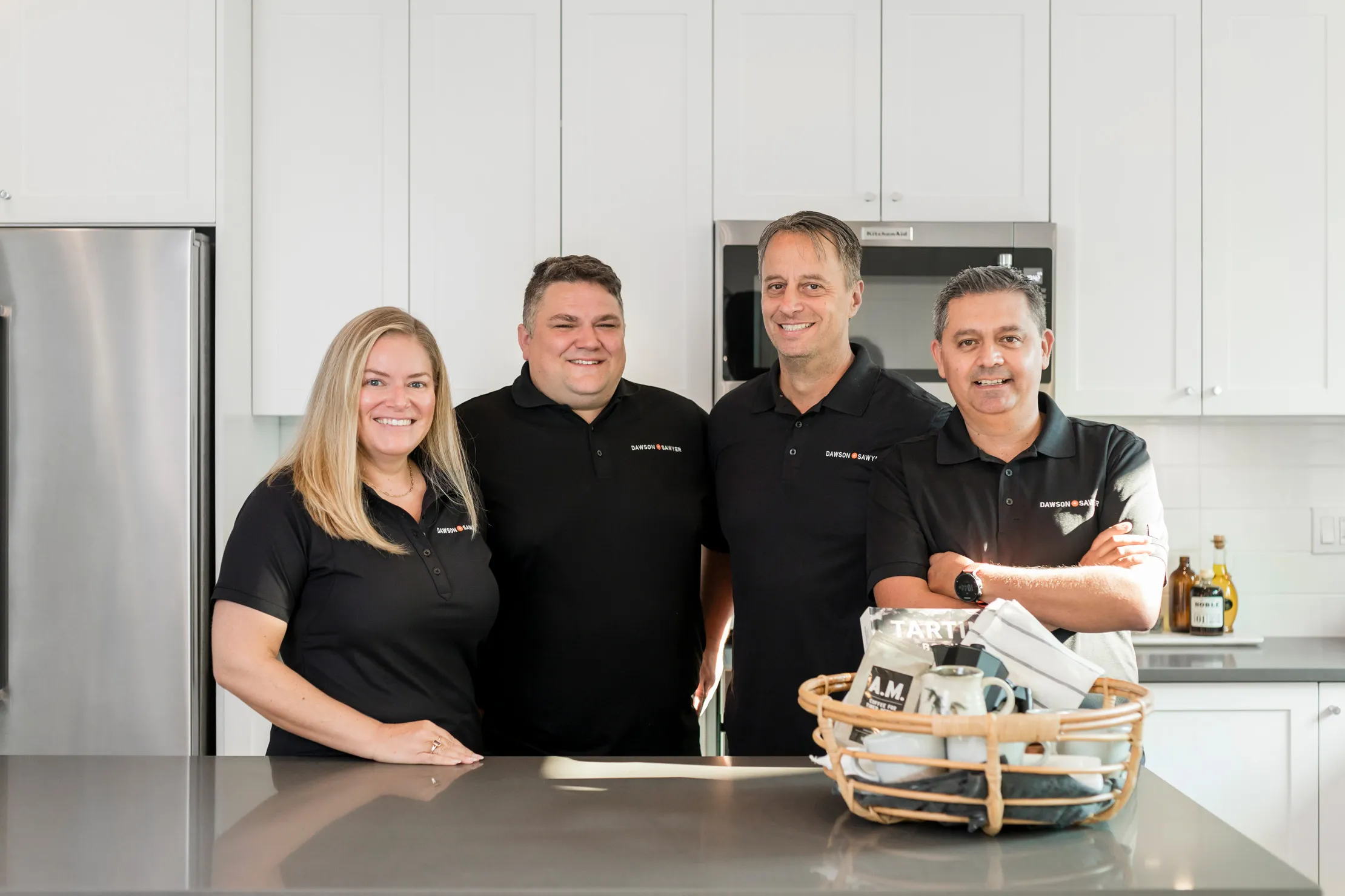 Dawson + Sawyer homeowner care team inside modern kitchen