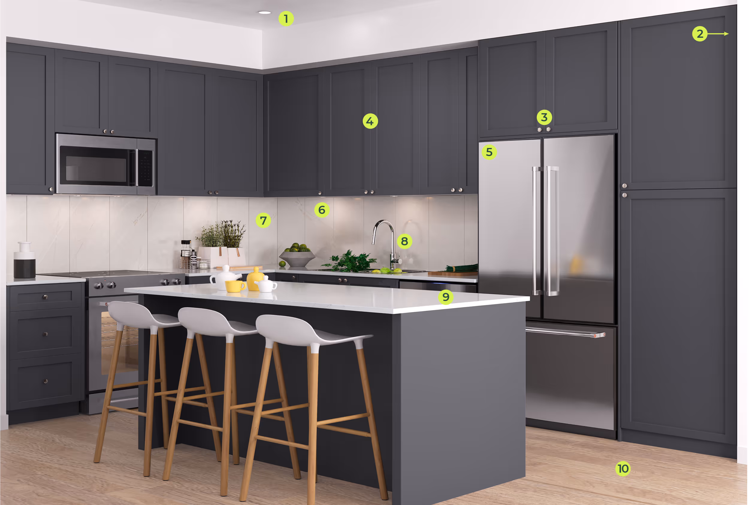 Modern kitchen with dark gray cabinets, a stainless steel refrigerator, built-in microwave, three wooden stools with white seats at a white countertop island, and light wood flooring.