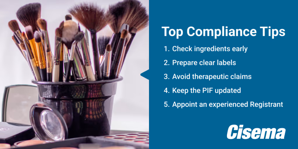 Cosmetic brushes in a black container placed beside makeup products on a vanity, with a blue panel on the right listing compliance advice titled 'Top Compliance Tips.' The five listed tips are check ingredients early, prepare clear labels, avoid therapeutic claims, keep the PIF updated, and appoint an experienced Registrant. The Cisema logo appears at the bottom right.