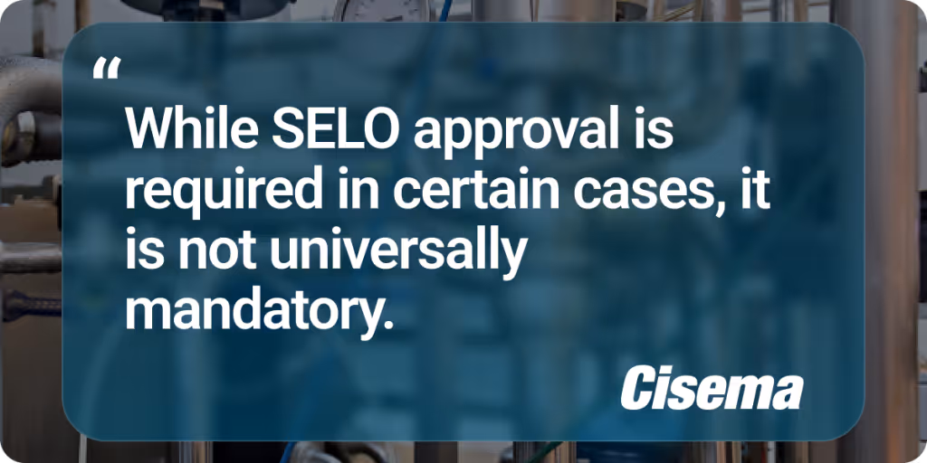 Graphic featuring a blurred industrial or manufacturing background overlaid with a teal-blue text panel displaying the quote, “While SELO approval is required in certain cases, it is not universally mandatory.” The quote is presented in white, sans-serif typography with quotation marks, conveying regulatory clarification. The Cisema logo appears in the lower right corner, indicating authorship by a regulatory consultancy specializing in compliance, product registration, and market access for businesses entering China and the Asia-Pacific region.