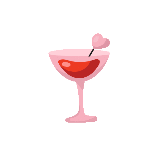 Cocktail rose dans un verre à pied avec une décoration en forme de cœur.