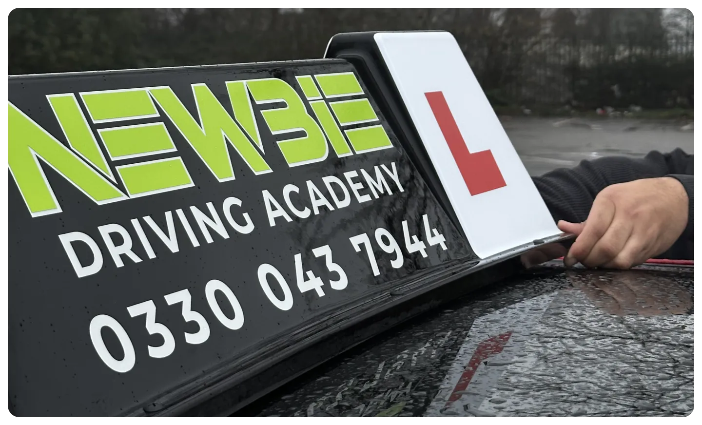 NewBie driving academy sign