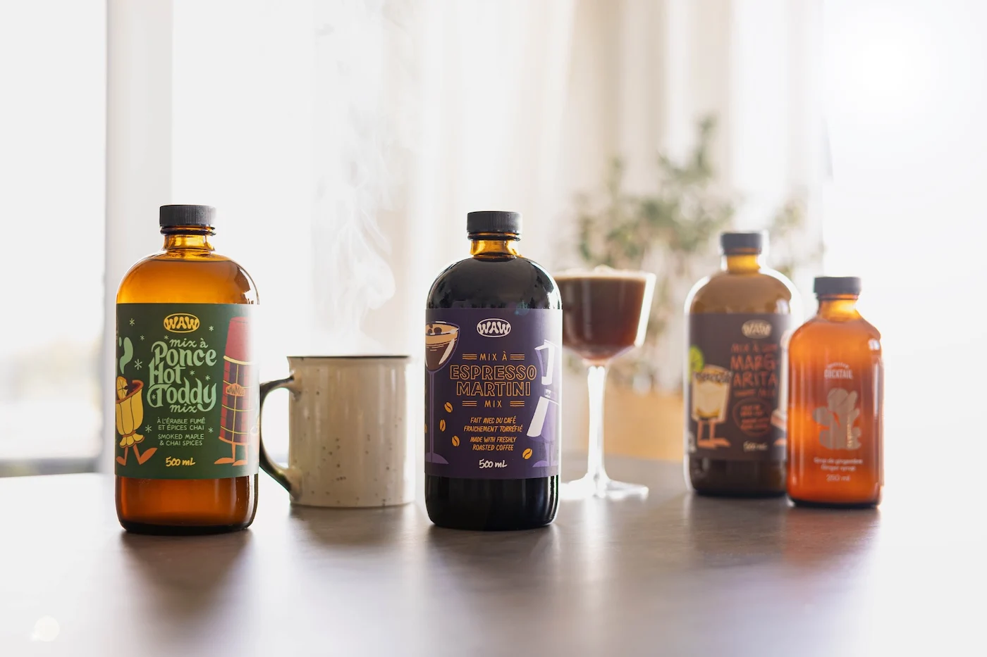 A woman bartender stirring her drink in a dim light bar