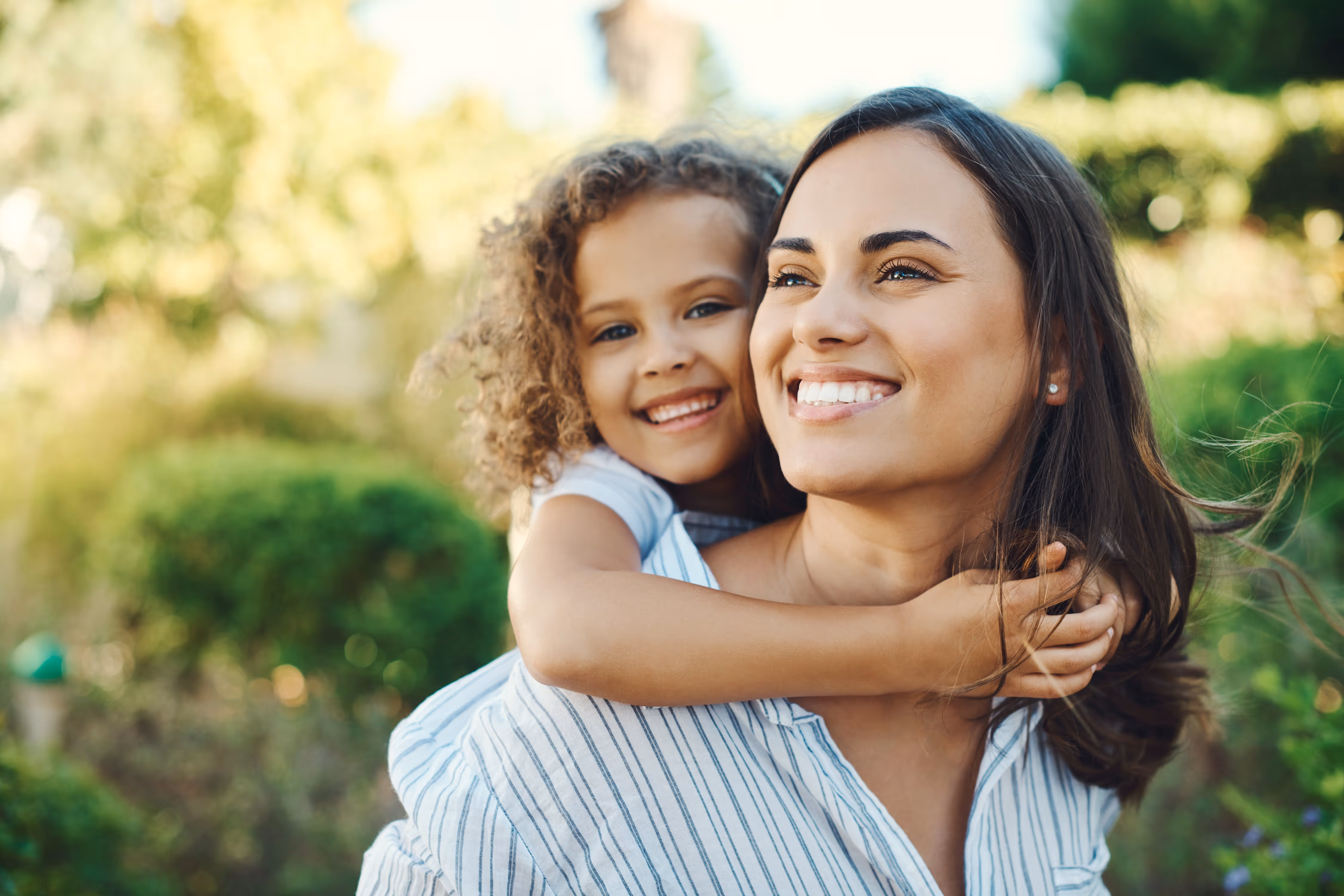 Woman holding little girl stock image