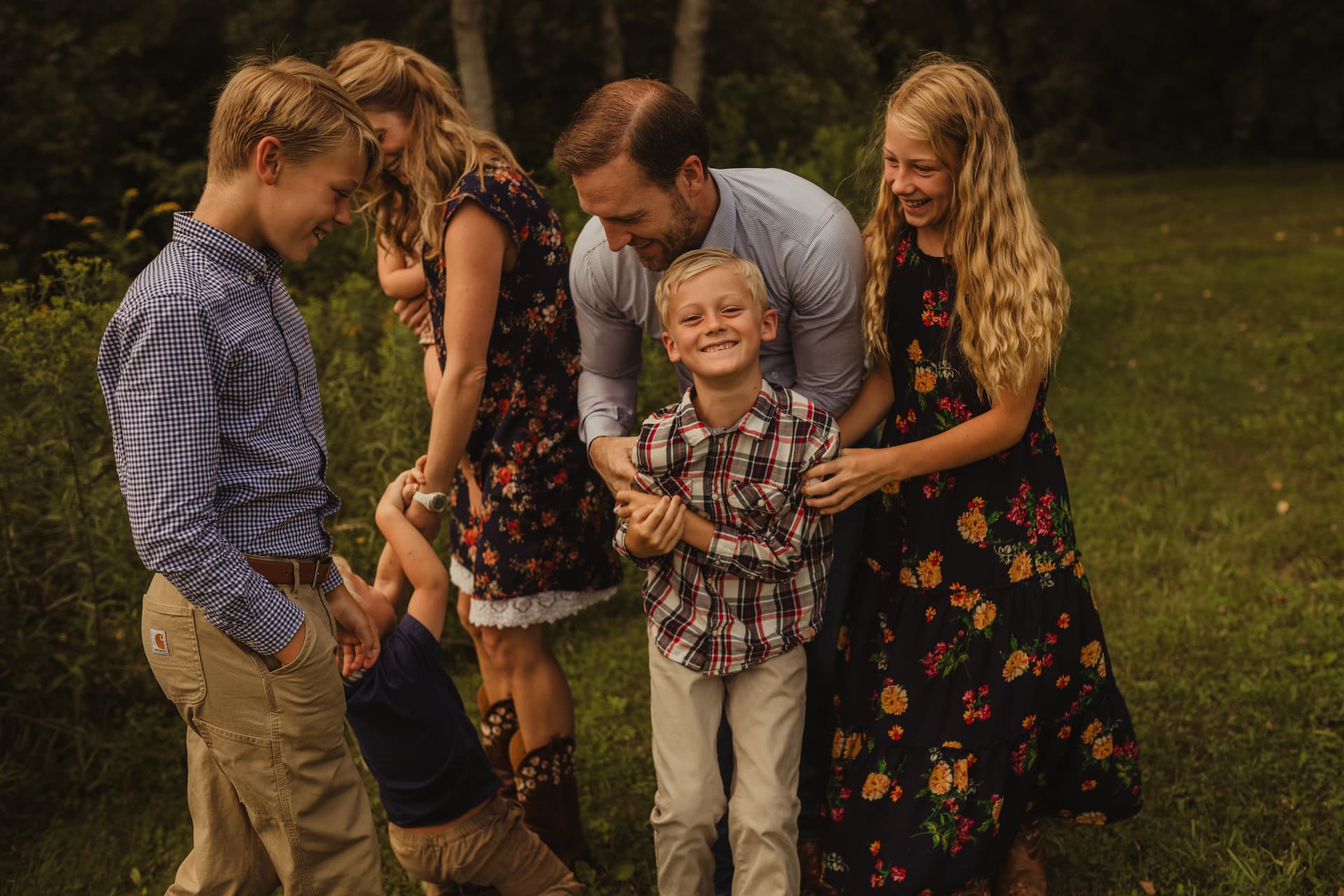 Jace Yarbrough laughing with family.
