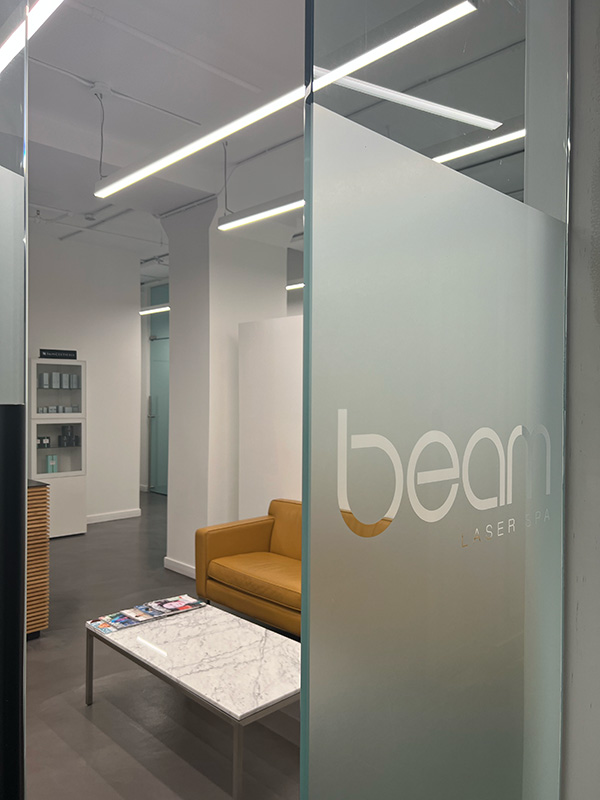 Office waiting room with Beam logo.