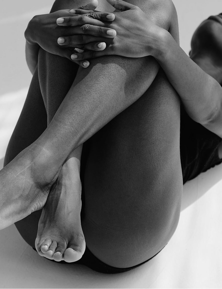 A close-up image of a person's legs