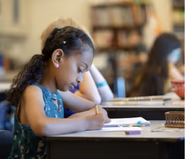 Girl in classroom studying
