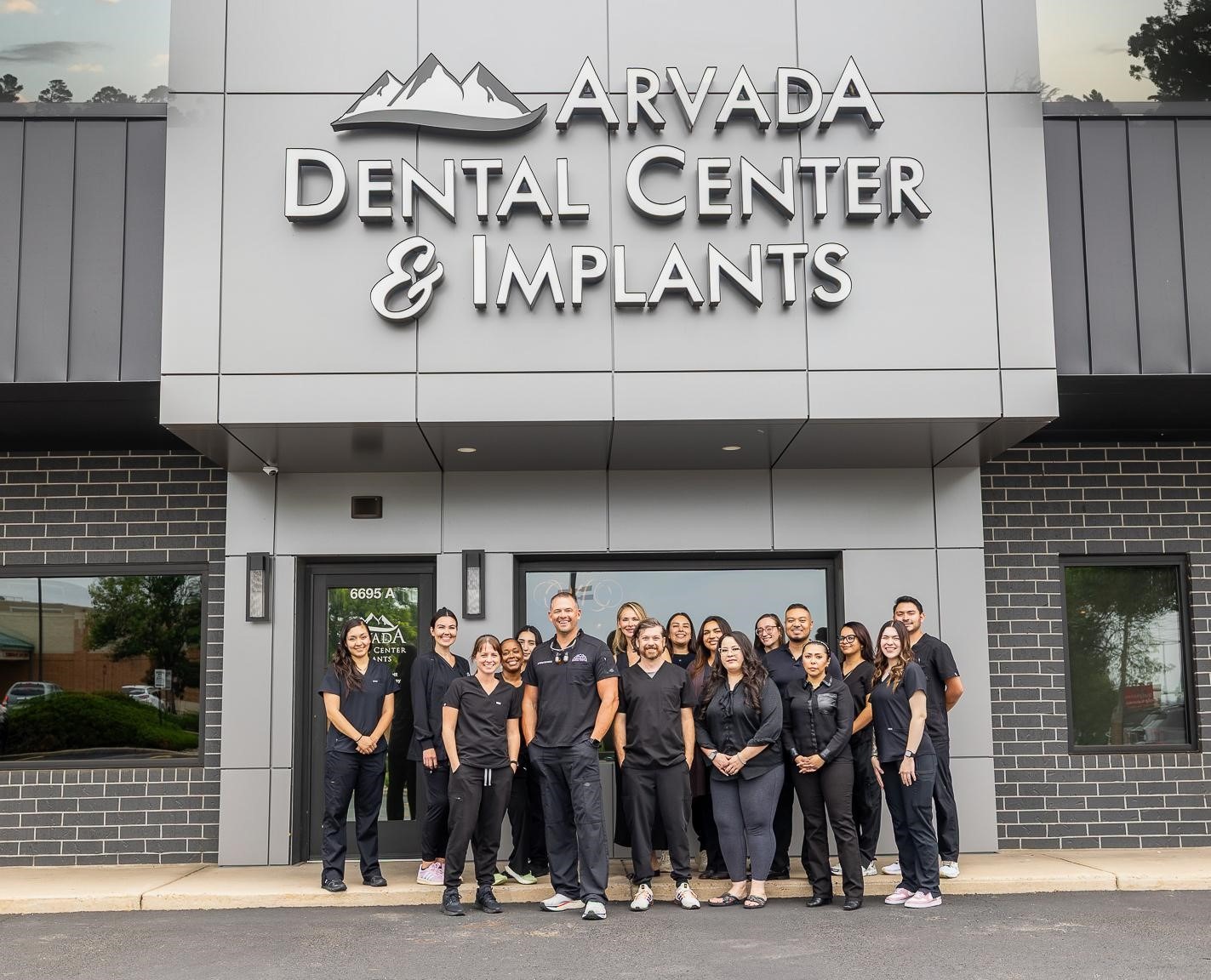 Arvada Dental Center & Implants team standing outside the practice