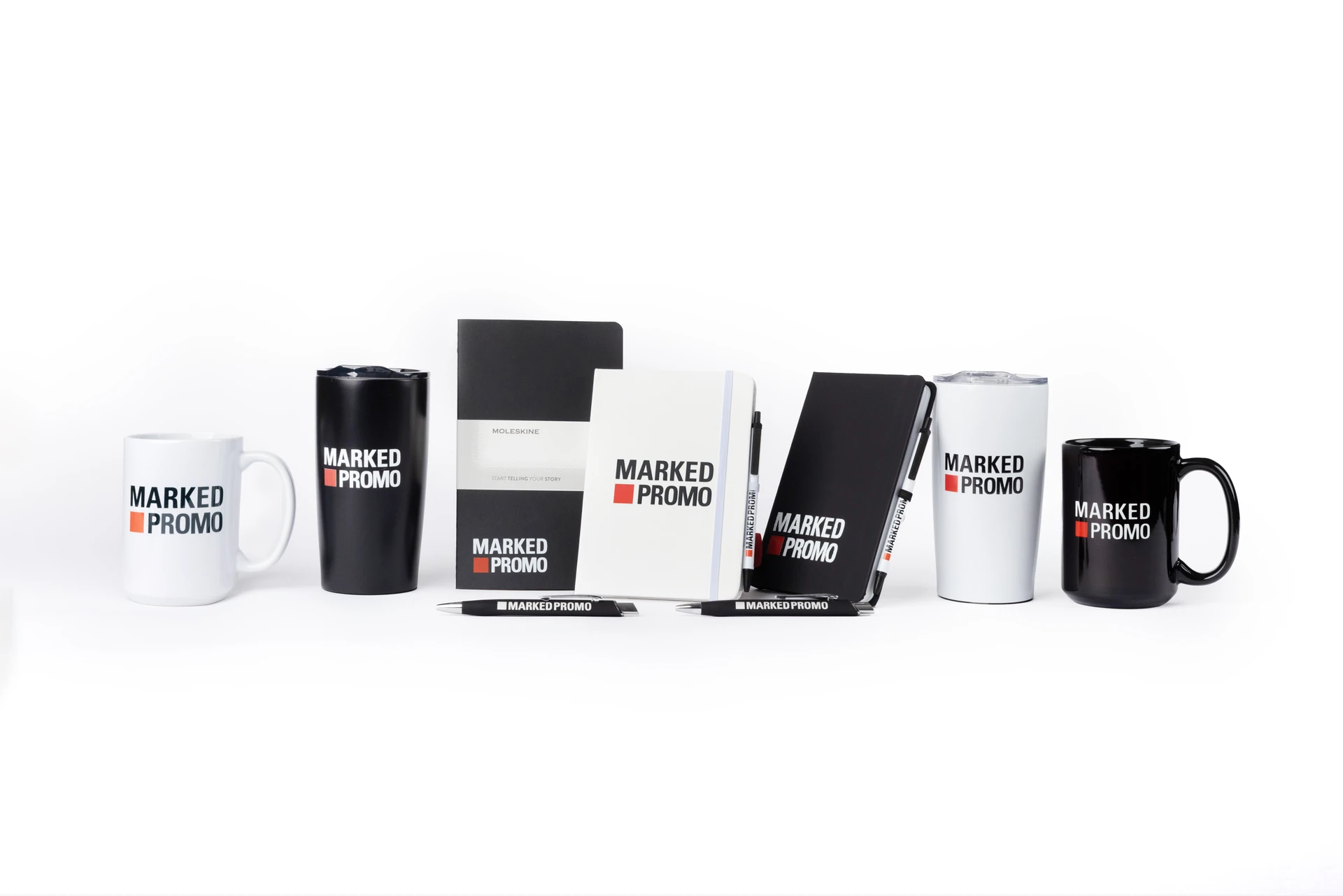 Marked Promo branded drinkware, notebooks and pens ready for customers