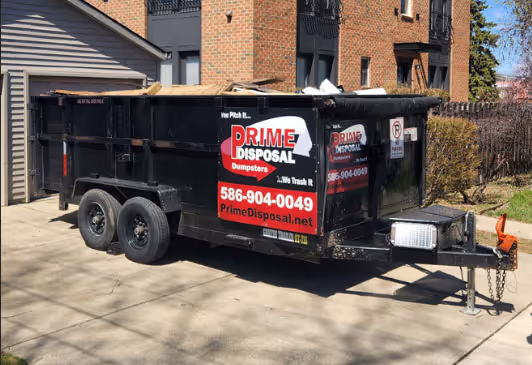 A two-wheel container that is 14 ft length × 7 ft width × 4 ft height.