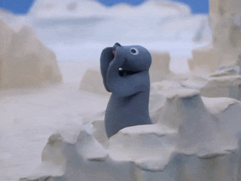 Claymation seal shouting or singing in an arctic landscape.