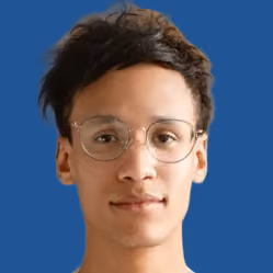 Headshot of a young man with glasses and short brown hair against a blue background.